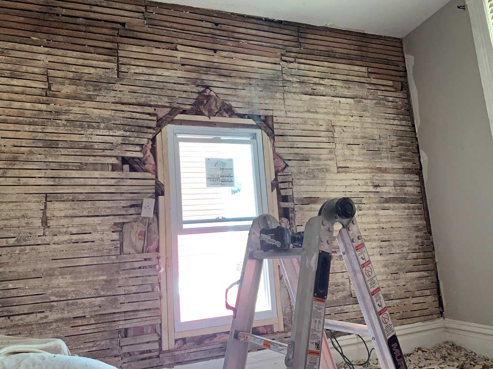 large plastered wall board repair job in midtown memphis tn by handyman carpenter offering window and drywall services for homeowners and property management companies