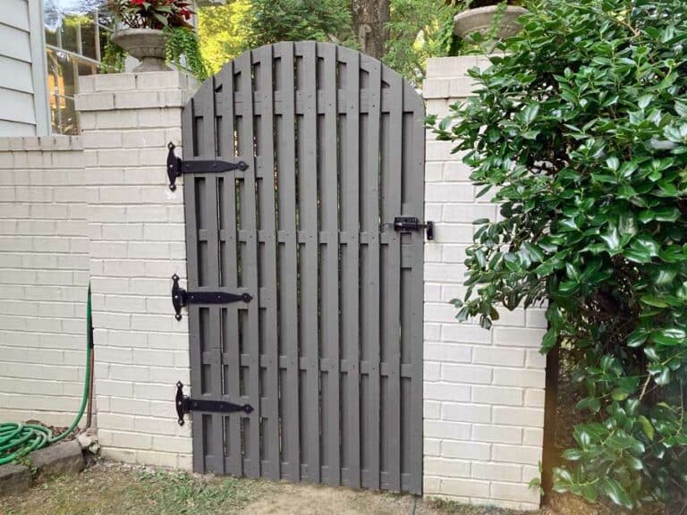 slick looking gate design by 1 handy craftsman in olive branch Mississippi for privacy closing in side yard of Memphis resident and writer.