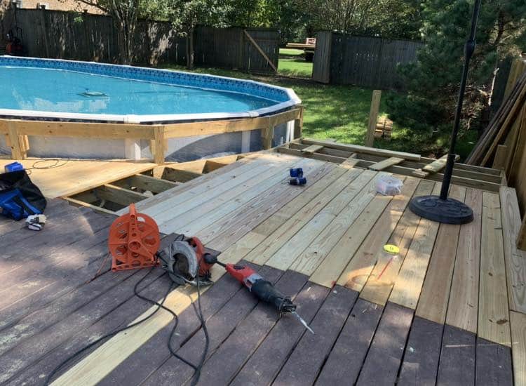 Build onto existing lakeside deck to surround above ground pool decking by local builder in memphis tn